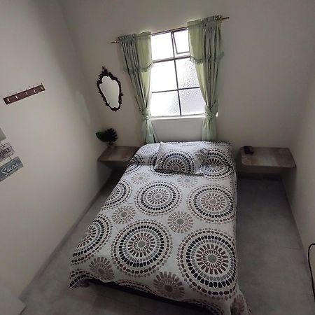 Pa Pasiar Hostal Medellín Szoba fotó